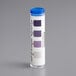 A close-up of a Noble Chemical chlorine test strip vial with purple, blue, and white strips.