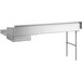 A white rectangular stainless steel dish table with a metal frame.