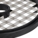 A metal circular grid with black and white accents.