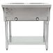 An Eagle Group stainless steel electric hot food table with two open wells on top.