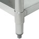 An Eagle Group stainless steel open well hot food table with a metal shelf and support.