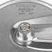 A Hobart stainless steel 1/8" slicing plate with a circular blade and handle.
