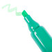 A close up of a green Universal desk style highlighter with a green tip.