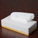 A Choice white tissue box on a table.