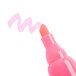 A close-up of a Universal fluorescent pink highlighter with a chisel tip.