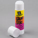 A white plastic container of 12 Avery White Permanent Glue Sticks with a white lid.