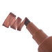 The chisel tip of an Avery Marks-A-Lot permanent marker with brown rubber.