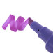 The chisel tip of a purple Avery Marks-A-Lot permanent marker writing on a white surface.