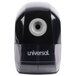 A black and white Universal electric pencil sharpener.