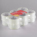 A group of 12 Universal One clear box sealing tape rolls.