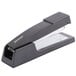 A black Universal full strip stapler with a silver handle.