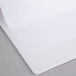 A white Avery Heavy-Duty View Binder with a sheet of paper inside.