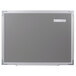 A Universal white melamine dry erase board with an aluminum frame.