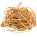 A pile of Universal beige rubber bands on a white background.