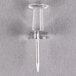 A close-up of a Universal clear plastic push pin with a metal spike.