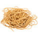 A pile of beige rubber bands on a white background.