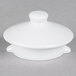 A TuxTrendz Bright White china teapot lid with a small knob on top.