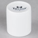 A bright white ceramic cylinder with "Tuxton" in black text.