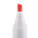 A white Universal chisel tip dry erase marker with a red tip.