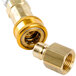 A T&S brass and silver gas appliance connector hose with a gold quick disconnect.