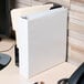 A white Avery Durable View binder on a desk.