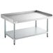 A stainless steel equipment stand with a galvanized undershelf.