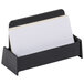 A Universal black plastic business card holder with a white paper in it.