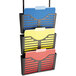 A Universal black plastic triple file holder with colorful folders in it.