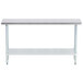 An Advance Tabco stainless steel work table with a galvanized shelf.
