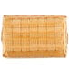 A rectangular woven basket with handles on a white background.