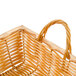 A rectangular wicker basket with handles.