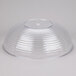 A clear Camwear round ribbed bowl with a clear lid.
