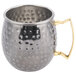 An American Metalcraft hammered black metal mug with a gold handle.