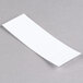A white paper strip on a gray surface with Avery Multi-Color Insertable Tab Dividers.