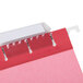 A white plastic UNV14118 letter size hanging file folder with a plastic clip on it.