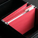 A drawer with UNV14118 red hanging file folders inside.