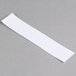 A white strip of paper with a white background.