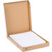 A Universal cardboard box with white paper dividers inside.