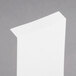 A white rectangular piece of paper with curved edges.