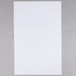 A white sheet of Universal Office copy paper on a gray surface.