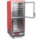 A red and silver metal Metro C5 heated holding cabinet with a door open.