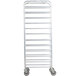 A Winholt stainless steel rack with wheels.