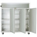 A white Traulsen G Series reach-in refrigerator with two open doors.