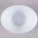 A Fineline white plastic Tiny Tureens bowl with a white plastic lid on a gray background.