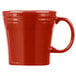 A Fiesta Scarlet china mug with a handle.