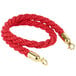 A red braided rope with gold ends.