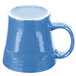 A blue Fiesta china mug with a white rim and handle.
