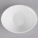 A case of 36 white porcelain oval bowls with a white background.