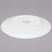 A white Reserve by Libbey porcelain plate with a circular design on the rim.