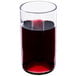 A clear Arcoroc wine tumbler filled with red wine.